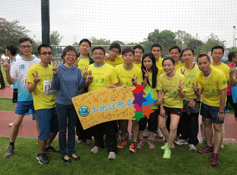 The Registry Manager, Mrs Amy Fong (the third from left) celebrates with the participants after the event
